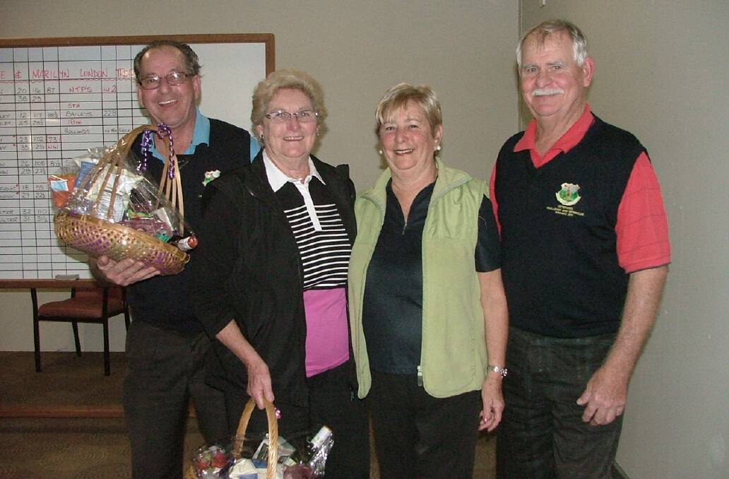 TOP OF THEIR GAME: The daily winners on Sunday in the foursomes Bob and Daphne Bailey with their prizes from the sponsors Marilyn and Dave London. 