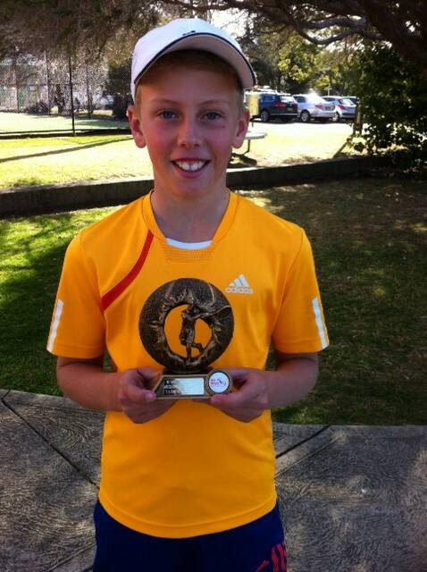 BIG SMILES: James Phillips is the winner of the 11 years boys at the Wollongong JDS. 