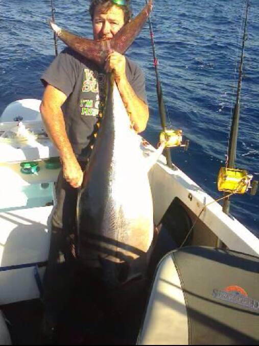 CATCH OF THE WEEK: Danny Turner shows off his giant bluefin from last Thursday’s ventures. 