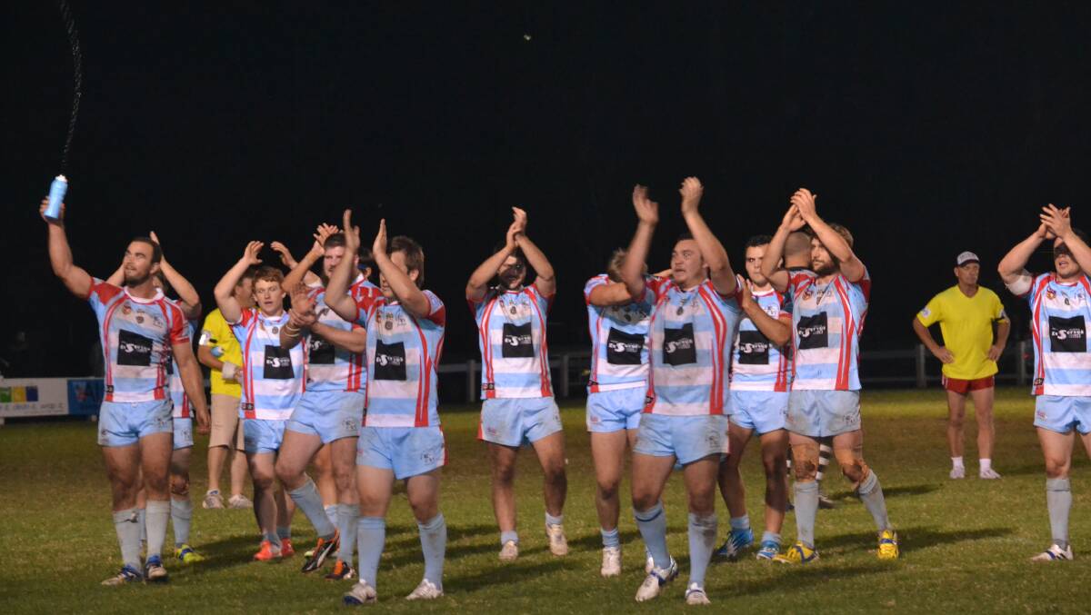 ROUND OF APPLAUSE: Milton-Ulladulla players applaud their home crowd who cheered them to a 20-18 win against Berry on Saturday night. Photo: GLENN ELLARD  