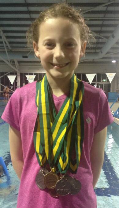 NATIONAL STAR: Jasmine Greenwood was a star at the school swimming nationals. 