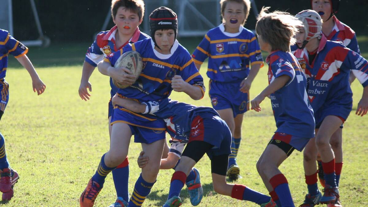 DETERMINED: Bomaderry u10 player Will Jeffery is unstoppable in his side’s 38-6 win over Gerringong last week. 