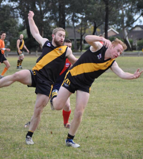 SMASH: It wasn’t a smooth game for the Bomaderry Tigers as two players collide. 