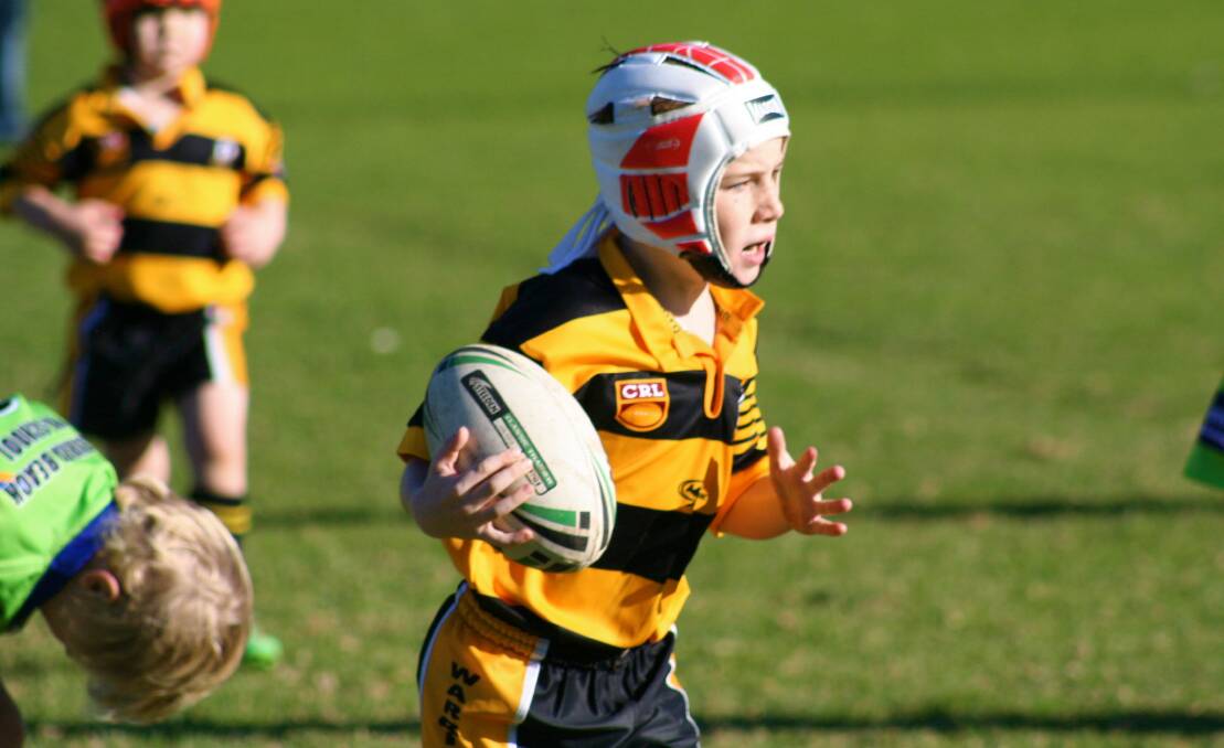 YOUNG GUN: Ultra Tune under 7 Wallaby star Kobie Hantis on his way to six tries in the last round. 