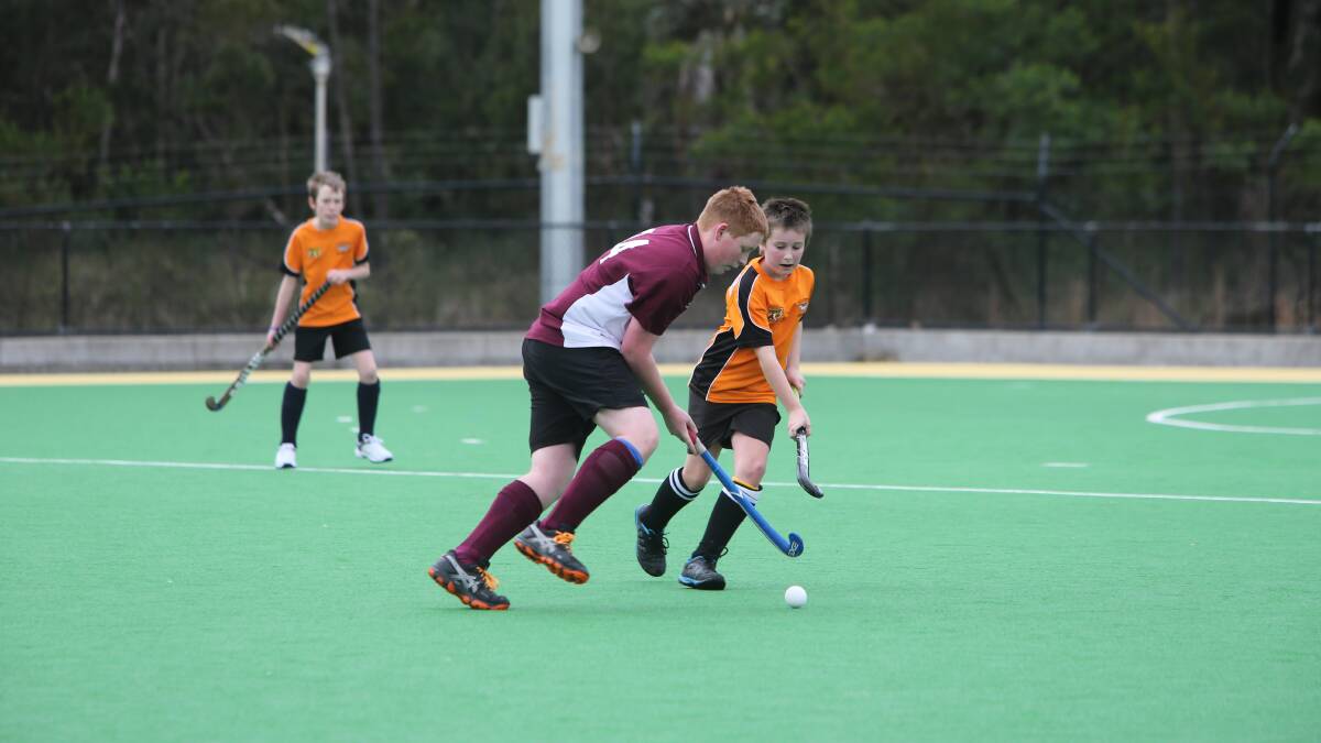 Action from the Shoalhaven junior hockey competition on Saturday at the Bernie Regan Sporting Complex. 