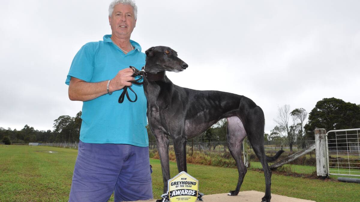 BEAUTIFUL: Nowra Hill trainer Garry Edwards shows off his prized dog Double Twist. 