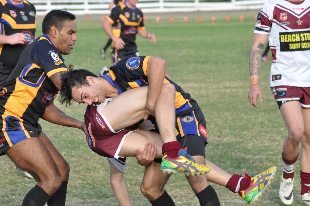 HARD HITTING: Nowra-Bomaderry Jets players Geoff Johnson and Mark Brandon wrap up Eagles centre Blake Jones during Sunday’s 36-win at Nowra Showground. Photo: PATRICK FAHY  