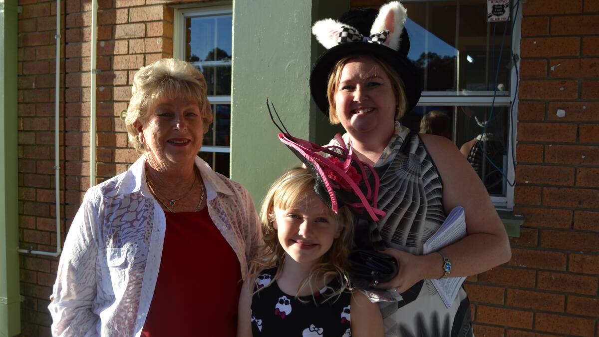 Yvonne Young, Ebony Donovan and Jodi Donovan from Sanctuary Point have a great day at the 2014 Greenwell Point Cup day at the Shoalhaven City Turf Club on Sunday. 