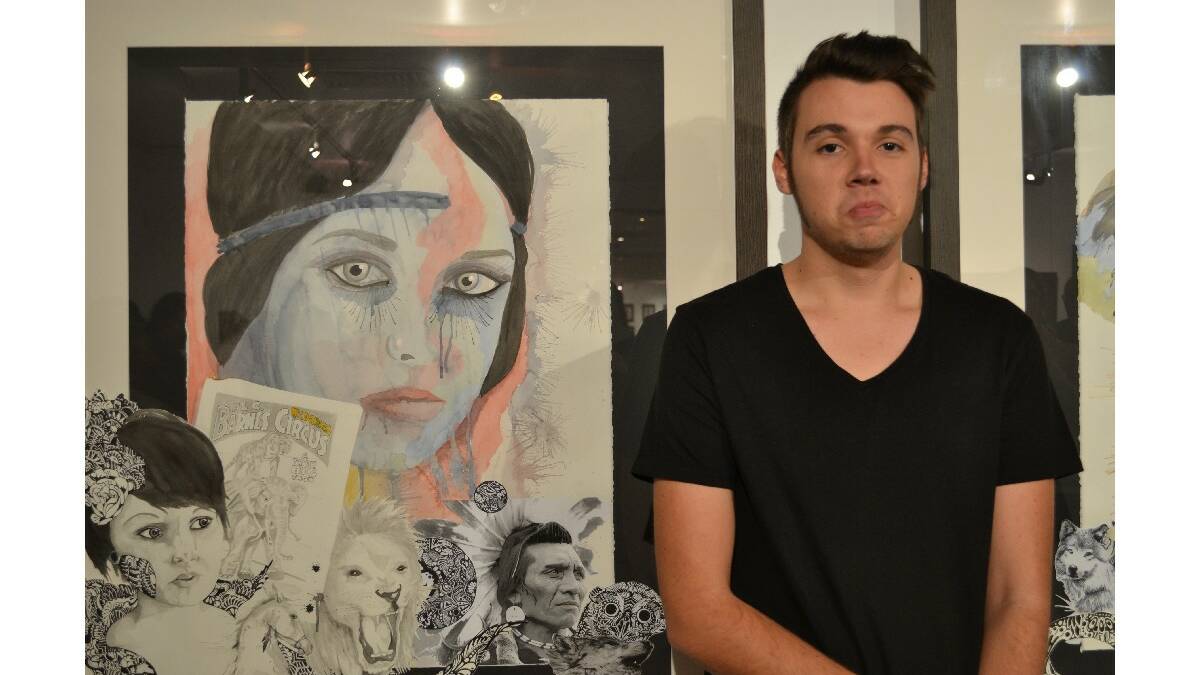 Brad Bishop from Nowra Anglican College with his artwork The Rose Tinted Menagerie at the opening of the Body Of Work: Wow’ showcase at the Shoalhaven City Arts Centre on Saturday.