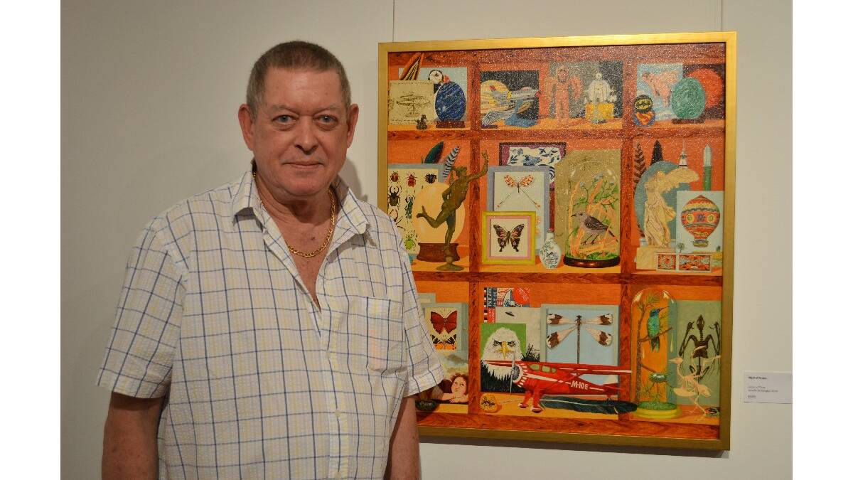 Kerry Kinnane, with his artwork Flight of Fancy at the opening of his exhibition Cabinets of Curiosities: the art of collecting at the Shoalhaven City Arts Centre on Saturday.