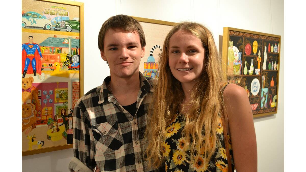 Ryan Conway from Worrigee and Carly Brown from Callala Bay admiring the art at the opening of art exhibition Cabinets of Curiosities: the art of collecting at the Shoalhaven City Arts Centre on Saturday.