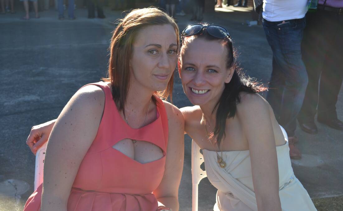 Cassie Stephenson from Nowra and Alison Madden from Worrigee enjoy the 2014 Greenwell Point Cup day at the Shoalhaven City Turf Club on Sunday. 