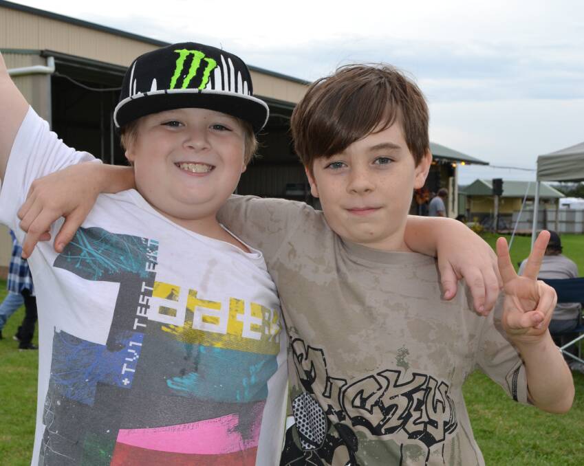 Trent Wheeler and River Clements from Huskisson are huge fans of all things country and have a great time at the Terara Country Music Campout on Saturday.