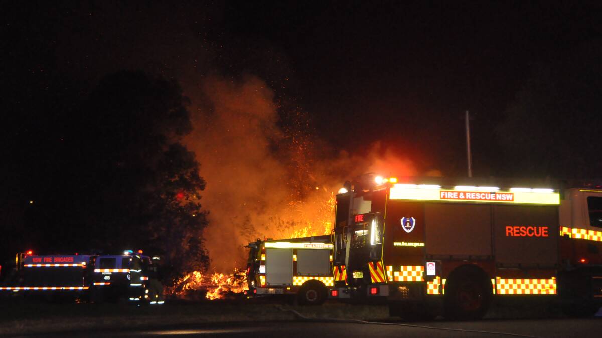 Shoalhaven Fire and Rescue NSW and Nowra Fire and Rescue crews turn a deliberately lit fire into a burn-off on Tuesday evening.