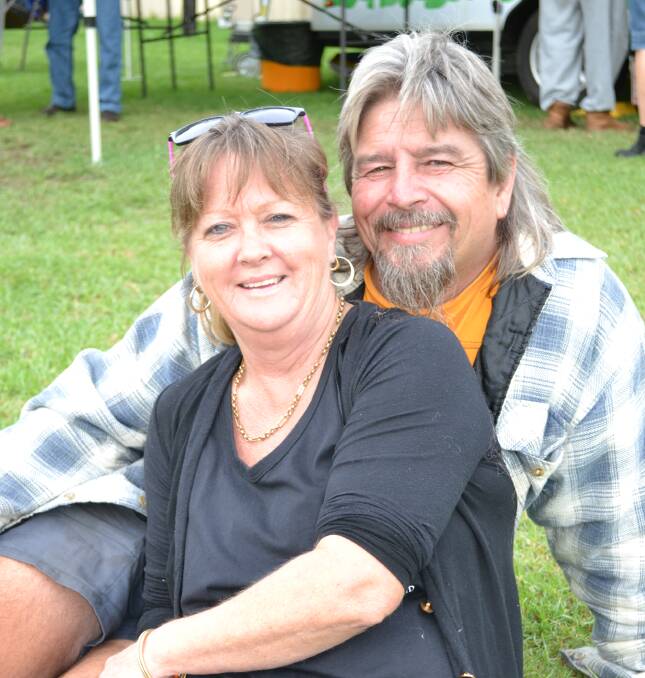 Janelle and Dave Wheeler from Woollamia find a lovely patch of grass to enjoy the music at the Terara Country Music Campout on Saturday.