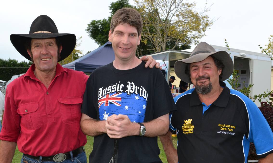 Ernie Constance from the Snowy Mountains, Scott Norton from Batemans Bay and Ned Nucifora from Braidwood keep entertained at the Terara Country Music Campout on Saturday.