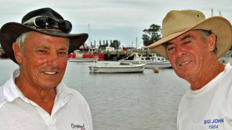FISHING TRADITION: Brothers Joe (left) and Fred Meli still use the little timber clinker Big John, once owned by their late father, which has been moored in Ulladulla Harbour since February 20, 1964.