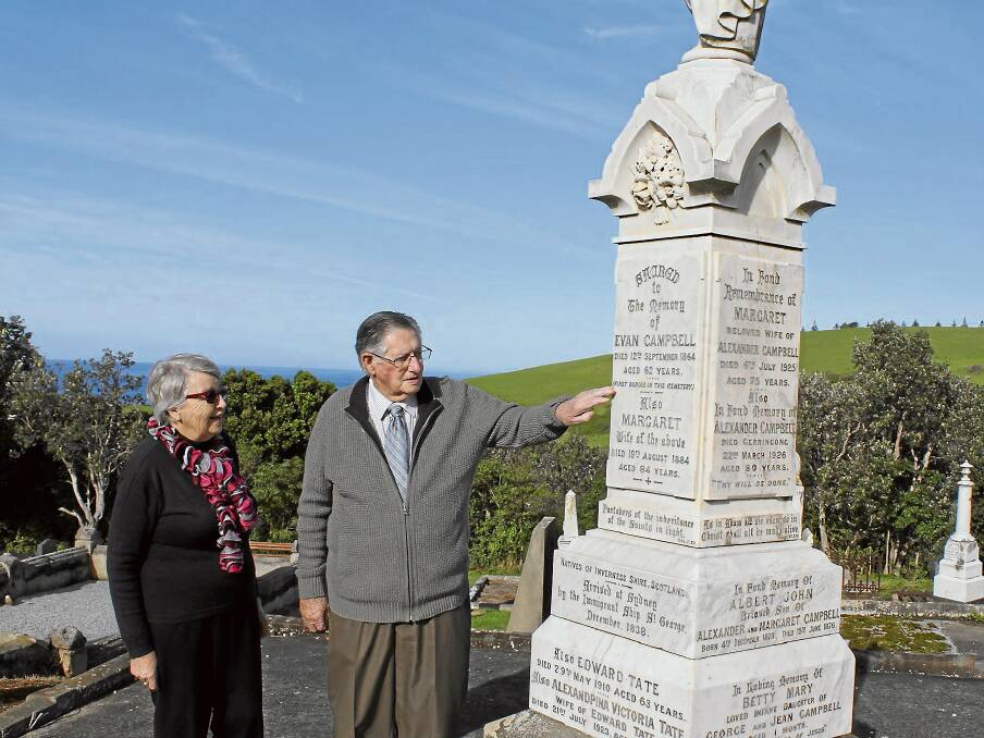 HISTORY: Gerringong Historical Society’s Margaret Sharpe and long-time Gerringong resident and former Kiama mayor Arthur Campbell at the Campbell family headstone. 	Photo: DAVID HALL
