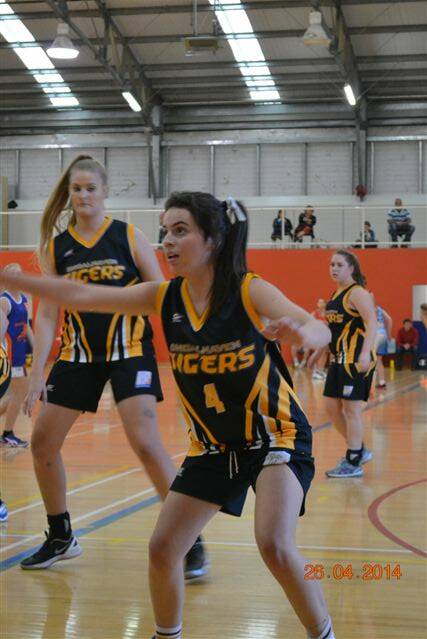 DEFENCE: Shoalhaven Tigers’ Issy Mangan is in defensive mode during round one of the Southern Junior League Basketball.