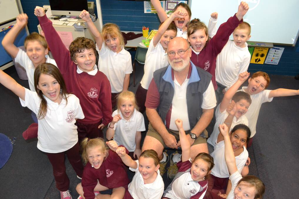 KING OF THE KIDS: Bob Mortyn, who will retire after more than 40 years, is still a hit with his students, this time Nowra Public year 2 class, 2A.