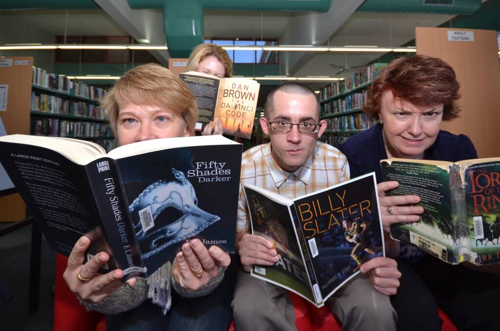 BOOK IT IN: Nowra Library staff members Derrilin Marshall, Jessica Green, David Caton and Debra Nettle are inviting you to reveal your most reviled reads for their “I Hate This Book” event on Thursday, May 22.