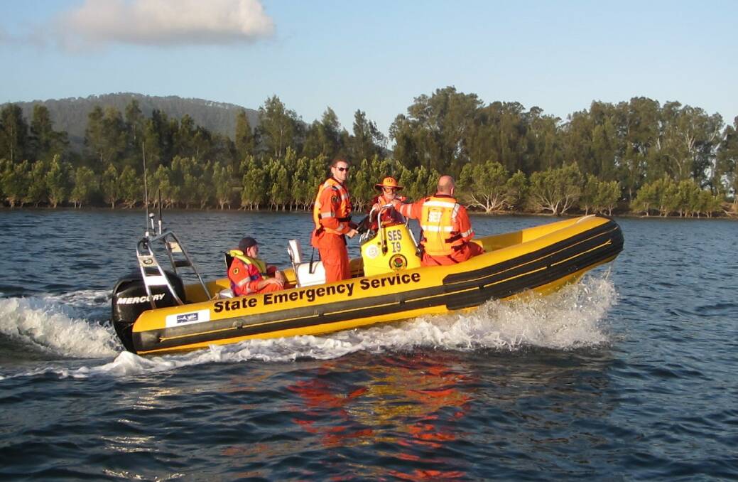 ALL ABOARD: Shoalhaven SES volunteers Mike Drew, Brett Beattie, Larry Coulthart and Matthew Allen in the organisation’s newest flood boat.
