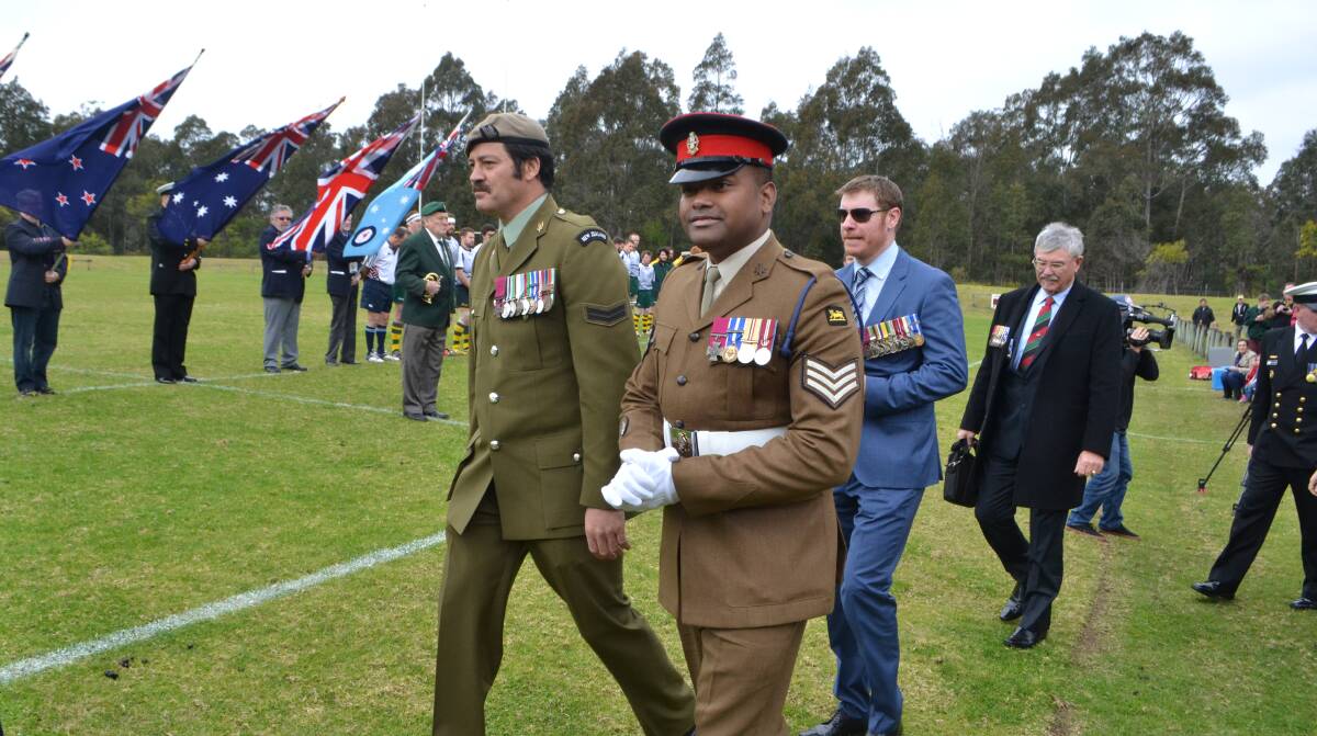 New Zealand Special Air Service lance corporal Willie Apiata VC, Princess of Wales Royal Regiment private Johnson Beharry VC, Royal Australian Regiment corporal Daniel Alan Keighran VC and Doug Baird representing Royal Australian Regiment Cameron Stewart Baird VC MG (posthumous) walk on the Shoalhaven Rugby Park field to welcome players before the kick off of the Digger Day match on Saturday.