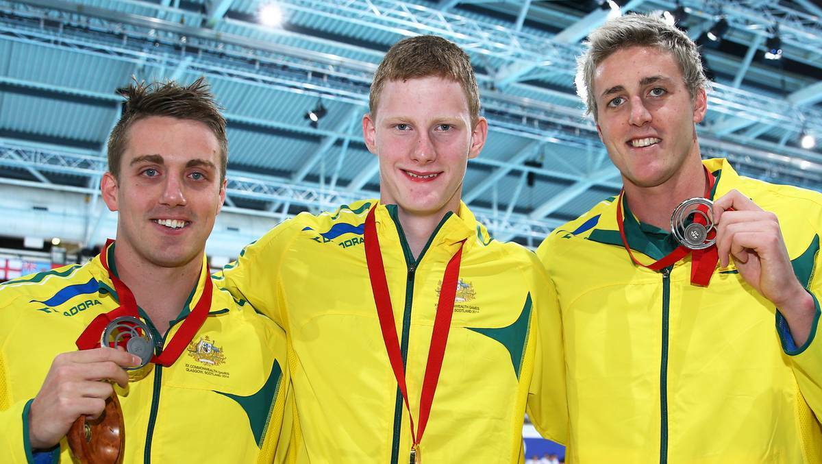 Gold medallist Rowan Crothers, centre, of Australia poses with silver medallist Matthew Cowdrey, left, of Australia and bronze medallist Brenden Hall of Australia after the medal ceremony for the Men's 100m Freestyle S9 Final where Crothers won gold in a world record time at Tollcross International Swimming Centre during day one of the Glasgow 2014 Commonwealth Games on July 24, 2014 in Glasgow, Scotland. Photo: Getty Images