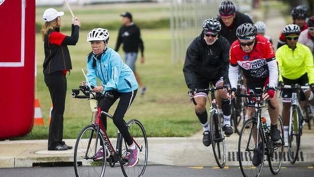 CANBERRA: Inspitrational burns survivor and NSW Woman of the Year, Turia Pitt of Narrawallee, leads a group of cyclists leaving Parliament House in Canberra on Monday.   