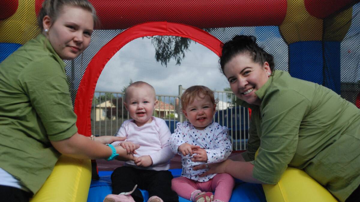 COOMA: Daisy's Childcare and Preschool raised hundreds of dollars for the Cooma Community Garden at its special market day on Saturday. Employees Jaide Hogan and Liz Graham looked after Ruby Wassink and Alexis Graham at the popular jumping castle.