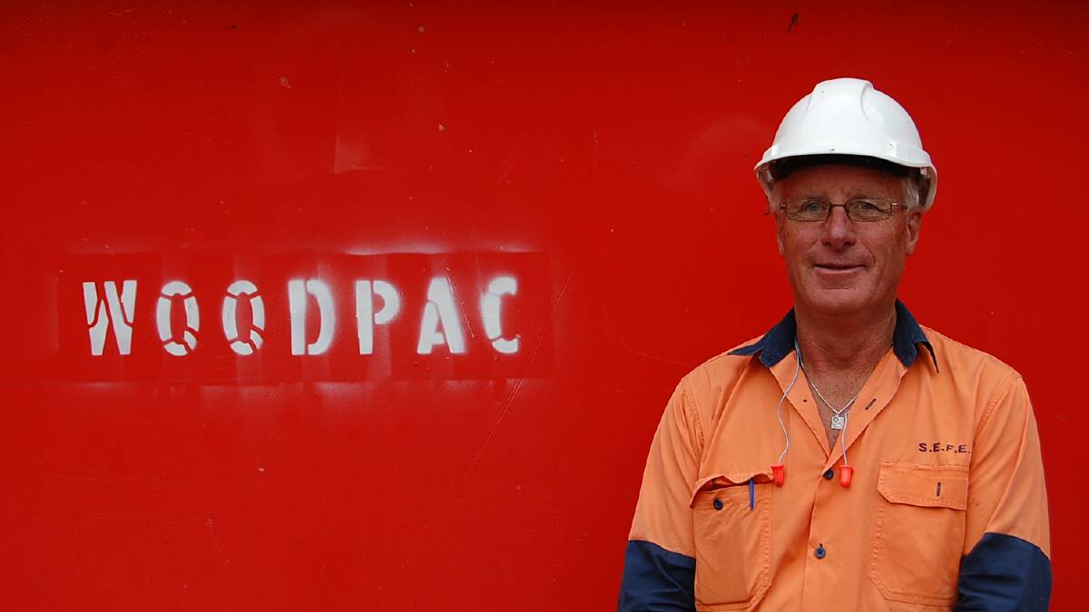 EDEN: South East Fibre Exports employee Mick Wood with the newly renamed “Woodpac”, in honour of his 40 years with the company.