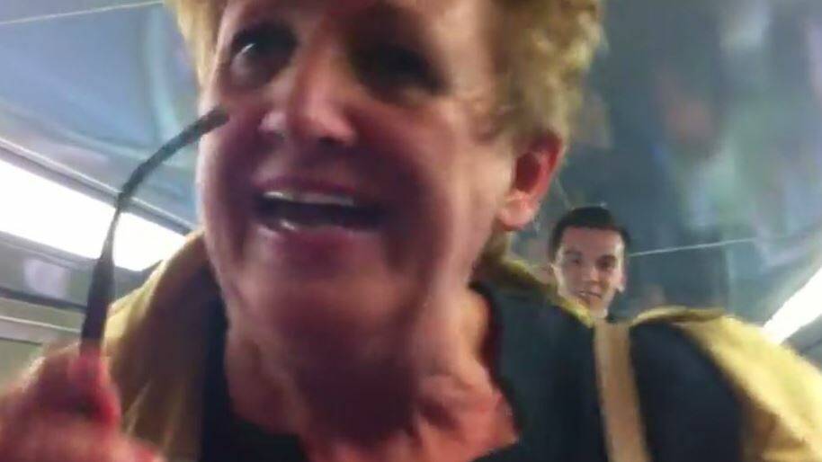 A still from video of the woman's tirade on the Newcastle-bound train.