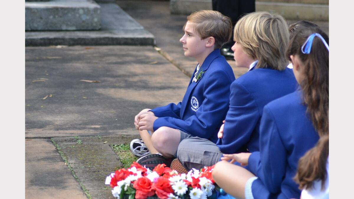 Berry Public School captain Jackson Bamber sits with classmates during the service.