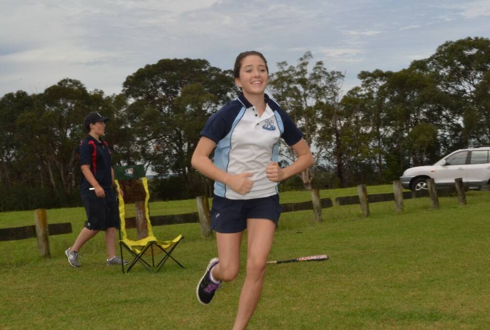 Emilly Klein from Nowra High School makes her move on the baseball field during baseball at the Girls Get Active Schools Day in Bomaderry.