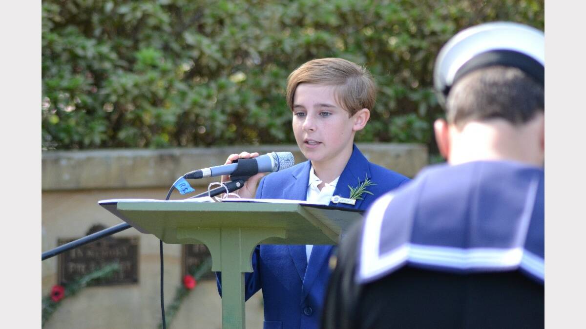 Berry Public School captain Jackson Bamber gives the prayer for the nation.
