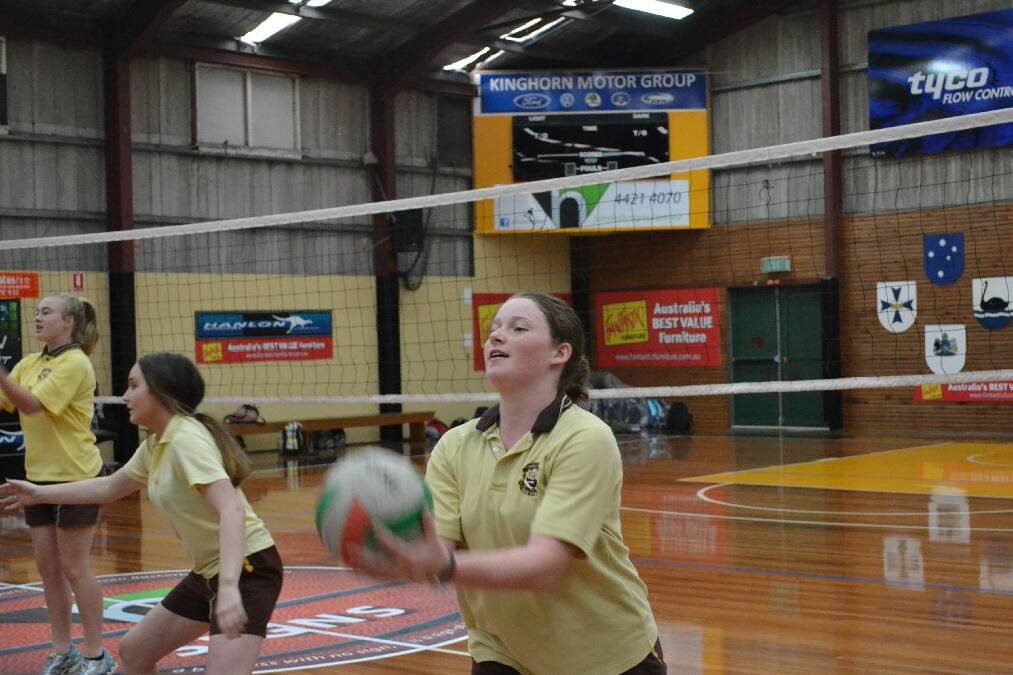 Olivia Vale from Shoalhaven High School gets a taste for volley ball during the Girls Get Active Schools Day.