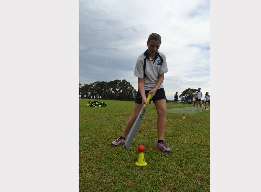 Nowra High School year 8 student Jacinta Thomason in action on the cricket pitch during the Girls Get Active Schools Day in Bomaderry.