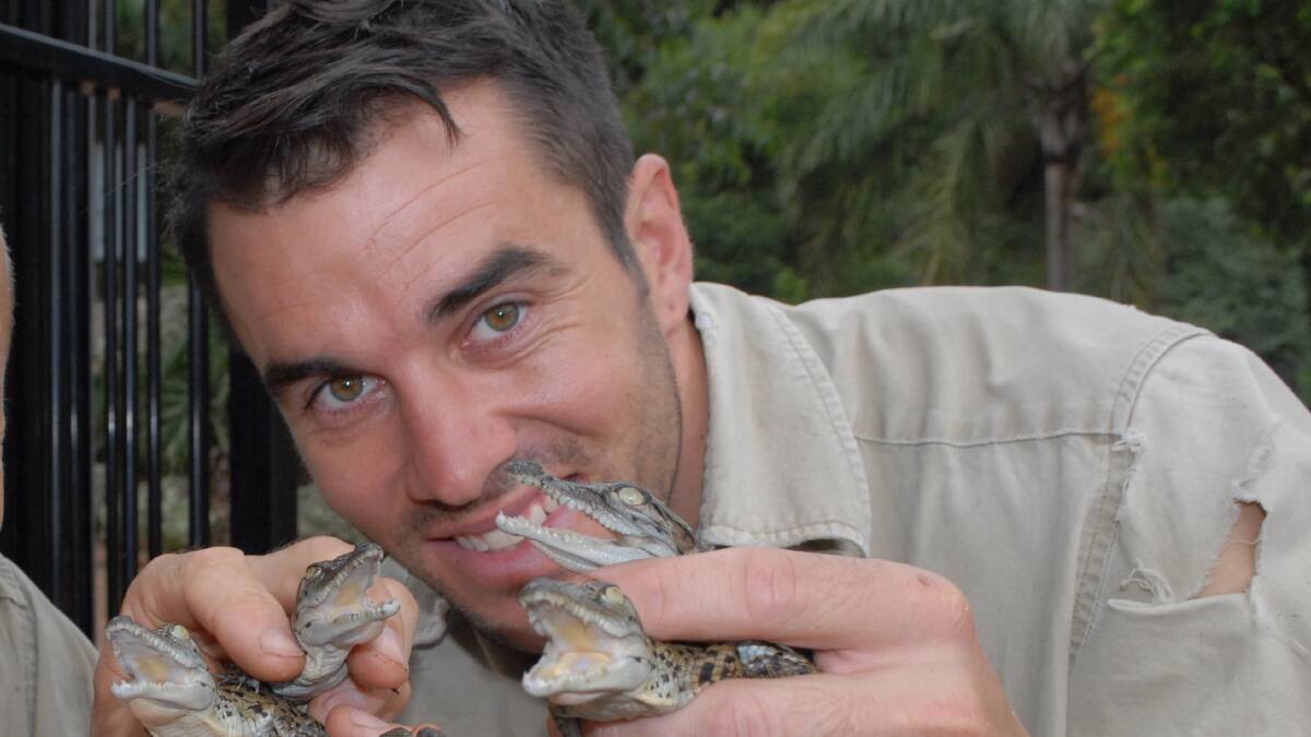 Shoalhaven Zoo animal handler Trent Burton knows the risks of working with crocodiles. 