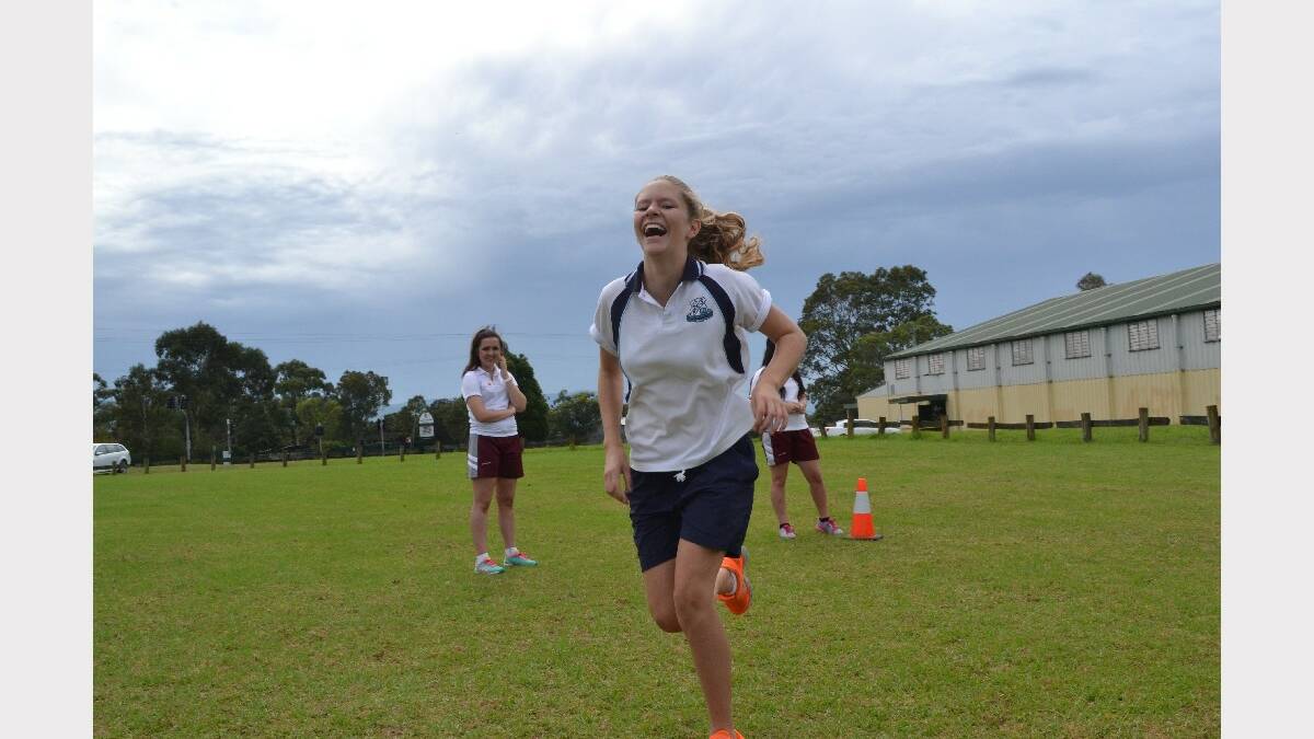 Heading for a home run, Nowra High School year 8 student Kirralee Moulds during baseball at the Girls Get Active Schools Day in Bomaderry.