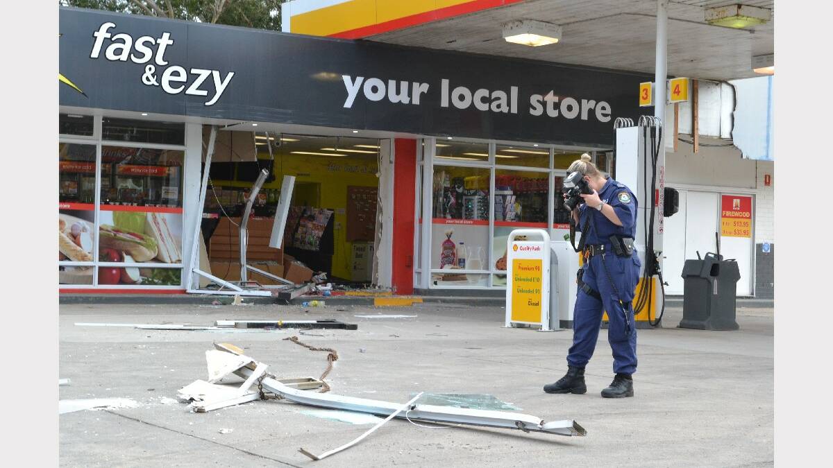 Nowra Crime Scene officer senior constable Pep Reid inspecting the theft of an ATM machine at Fast and Ezy store and Shell garage at Wandandian.