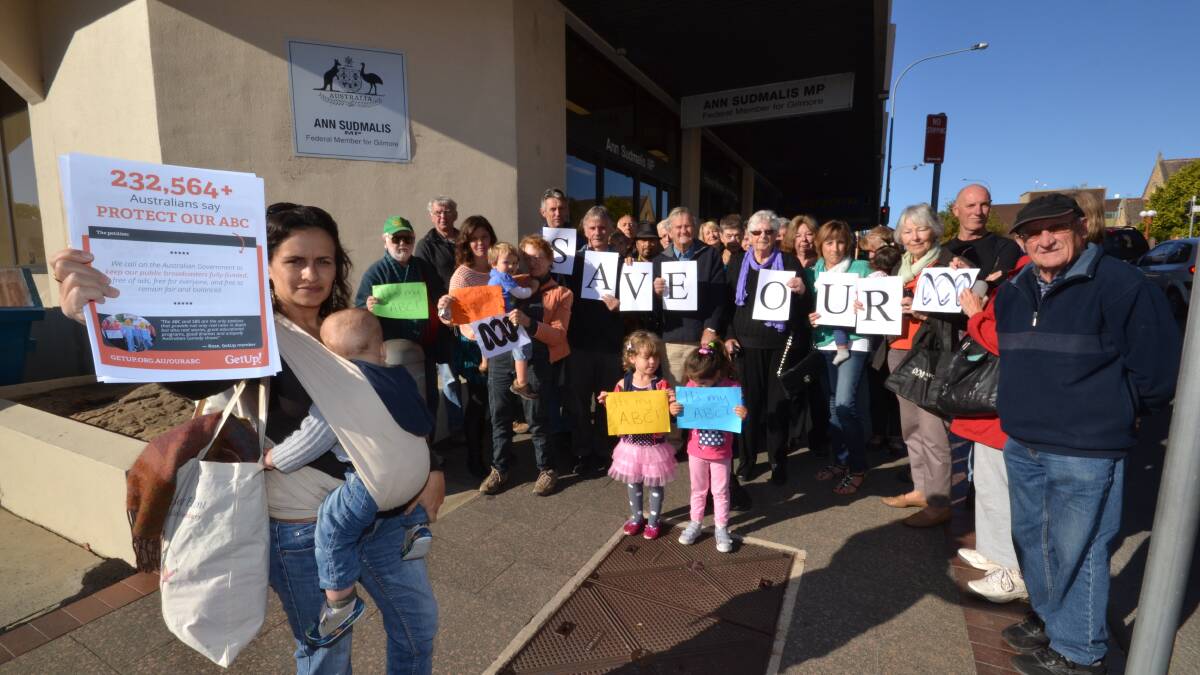 A protest at possible budget cuts to the ABC took place outside Gilmore MP Anne Sudmalis' office Wednesday morning.