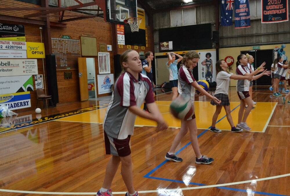 Vincentia High School year 8 student takes her volley ball very seriously during the Girls Get Active Schools Day.