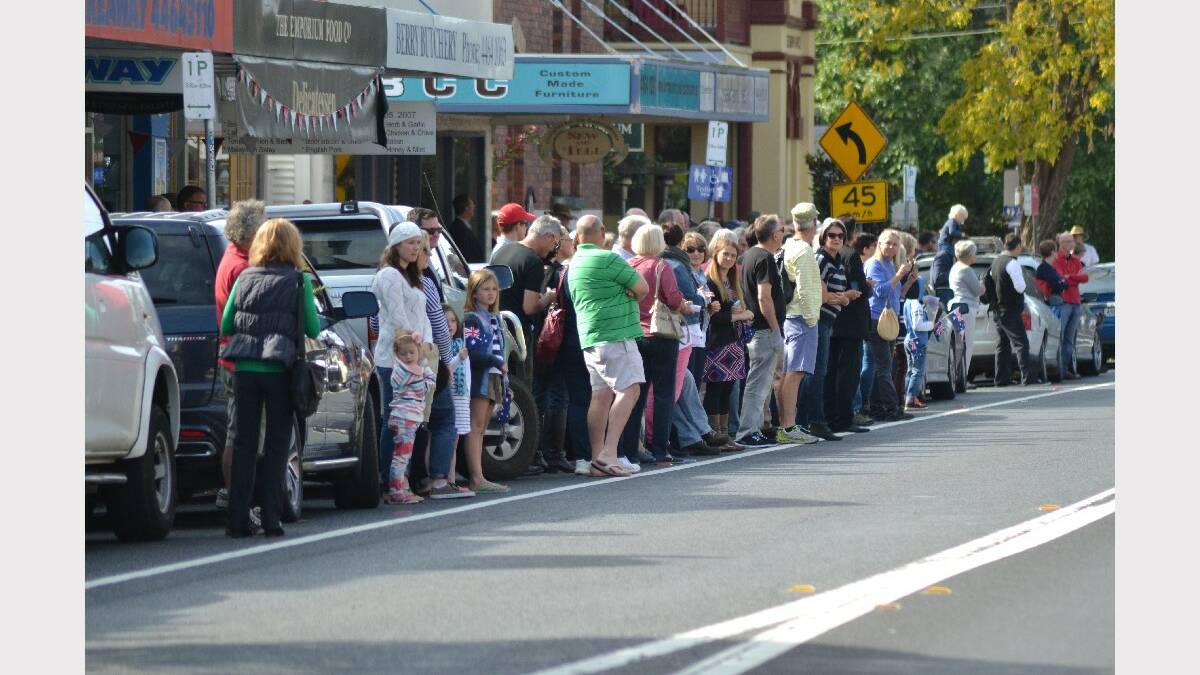 A crowd gathers to see the 2014 Berry Anzac Day march on Friday morning.