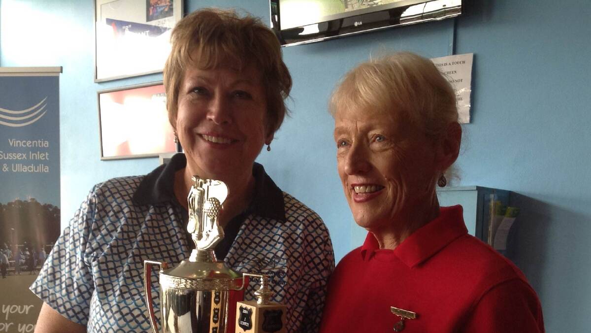DELIGHT: Helen Davison was delighted to be presented with the 2014 Country Club Cup by president Lesley.