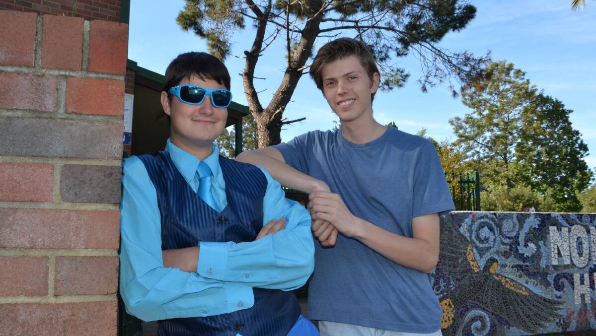 BREAKING DOWN BARRIERS: Autism sufferer and Nowra High year 12 student Gavin Walker with school captain Ben Standen after speaking about his condition at a special fund-raising day for Autism Speaks.