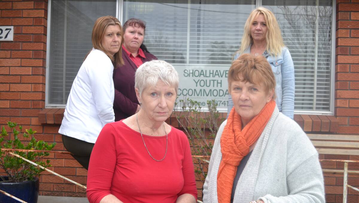 DEVASTATED: Shoalhaven Youth Accommodation chairman June Baker and manager Kerri Snowden with staff Alison Penbery, Kathy Cox and Julie Budgen are gutted by the state government’s decision not to award them the tender under the Going Home Staying Home reform.