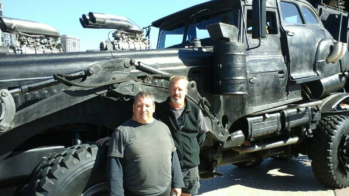 QUIET ACHIEVERS: Mark Gatt from Culburra Beach and Scott Cole from Greenwell Point with the War Rig from Mad Max Fury Road. Both men spent the last five years working on the film.
