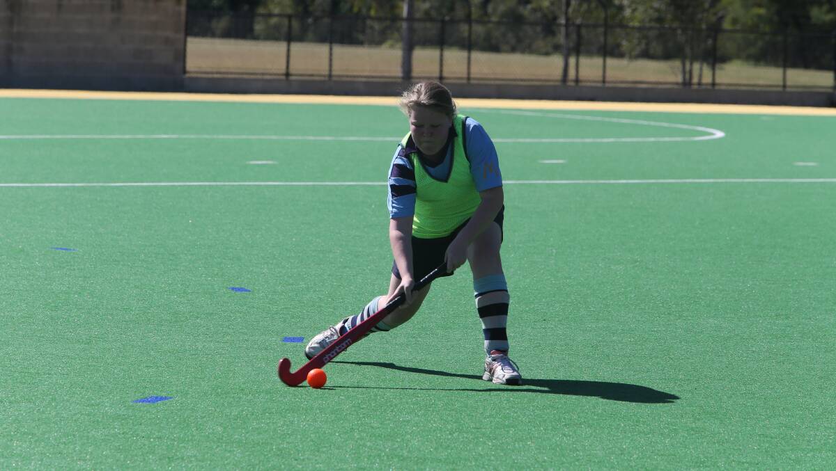 GIVE IT A GO: Shoalhaven hockey player Sarah Hamilton proved that juniors and women can excel at the sport in the 2013 season.
