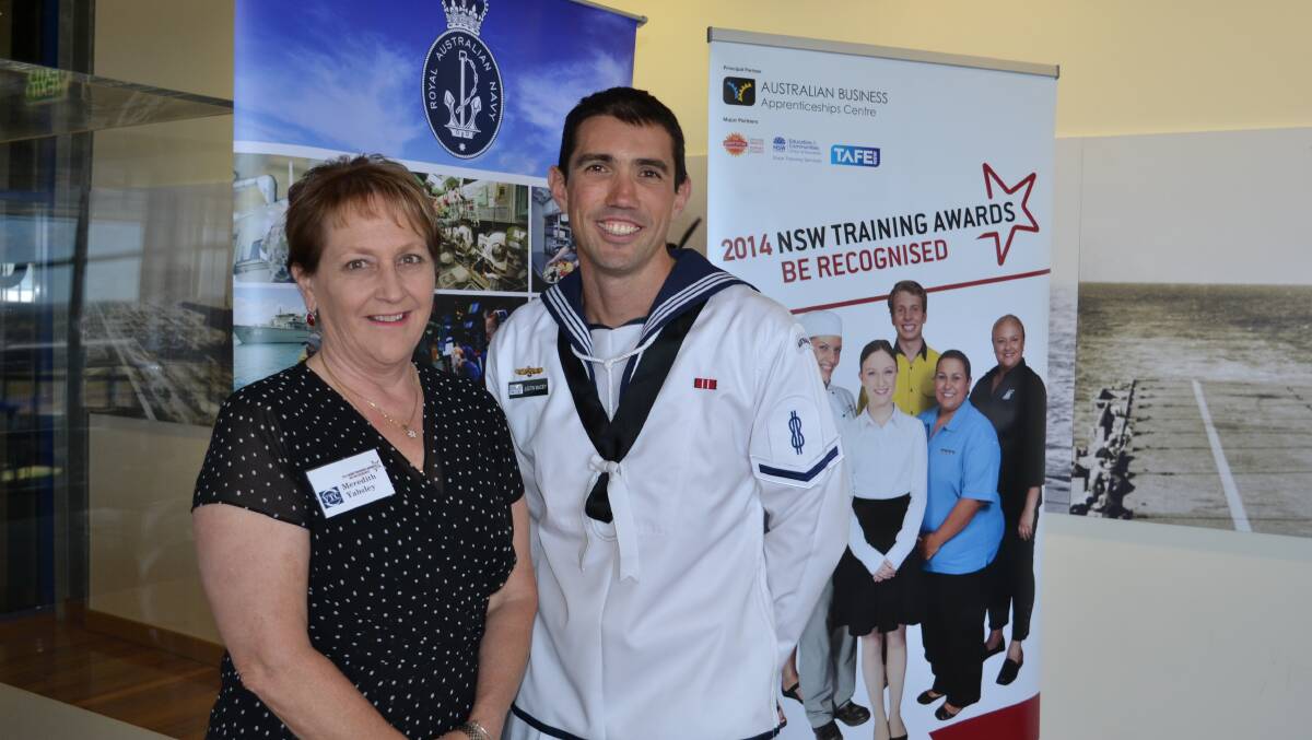 BIG LAUNCH: RAN able seaman and 2013 Apprentice of the Year for the Illawarra and South East NSW Justin Macey launches this year’s Illawarra and South East NSW Training Awards with Vocational Training Committee chairperson Meredith Yabsley at the Fleet, Air, Arm Museum on Friday.