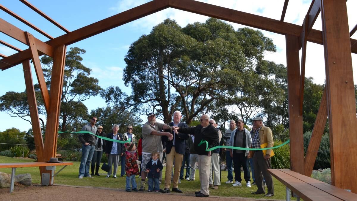 OFFICIAL OPENING: The driving forces behind the Shoalhaven Heads’ arboretum Rob Stewart and Roger Tilley join Kiama MP Gareth Ward to officially open the formal entry to the community garden in Curtis Park. Photo: ROBERT CRAWFORDOFFICIAL OPENING: The driving forces behind the Shoalhaven Heads’ arboretum Rob Stewart and Roger Tilley join Kiama MP Gareth Ward to officially open the formal entry to the community garden in Curtis Park. Photo: ROBERT CRAWFORD